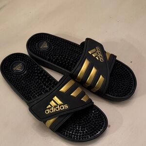 Adidas Black Slides with Gold Stripes